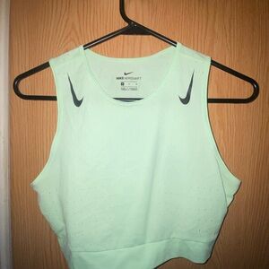 Women’s neon green Nike aeroswift cropped workout tank. Size M